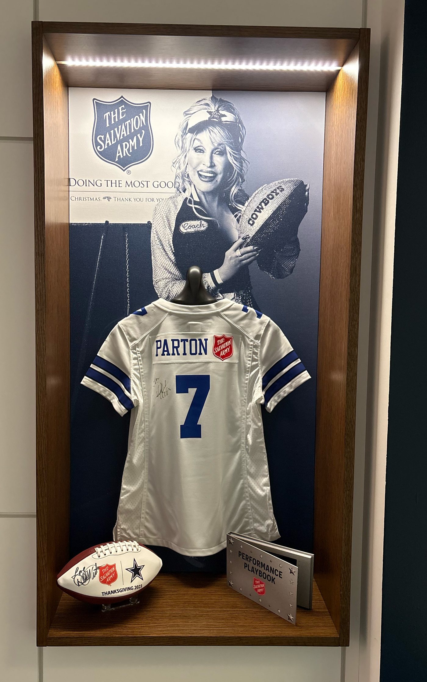 Dallas Cowboys conference room display featuring Dolly Parton